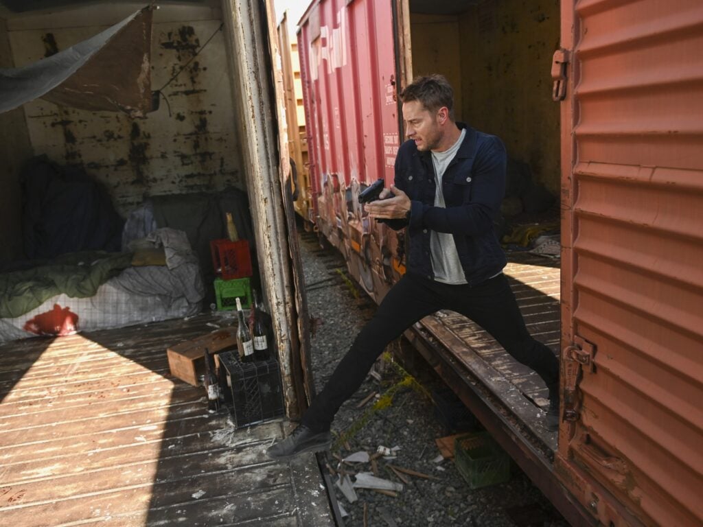 Colter searches a rail car for a missing teen during Tracker Season 1 Episode 3.