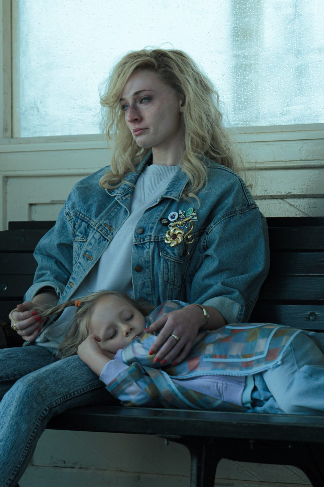 joan and her daughter Kelly on a bench.