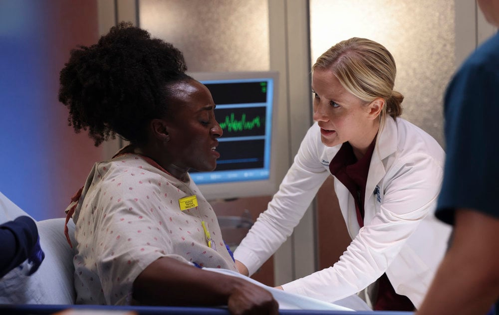 Hannah asking a patient where it hurts on Chicago Med Season 10 Episode 3