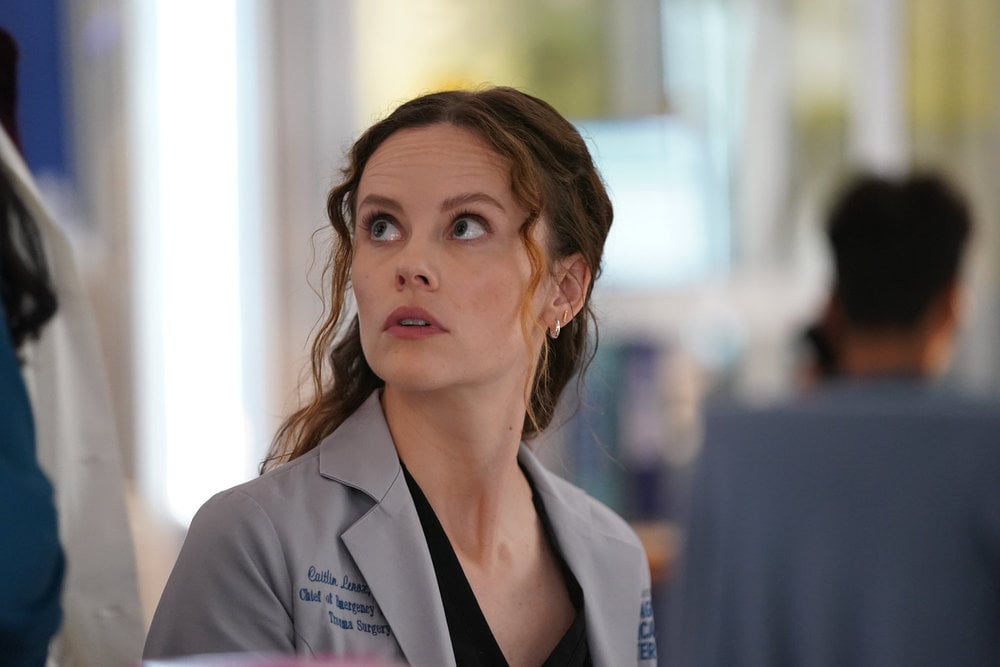 Lenox with her head twisted over her shoulder and looking nervous on Chicago Med Season 10 Episode 5