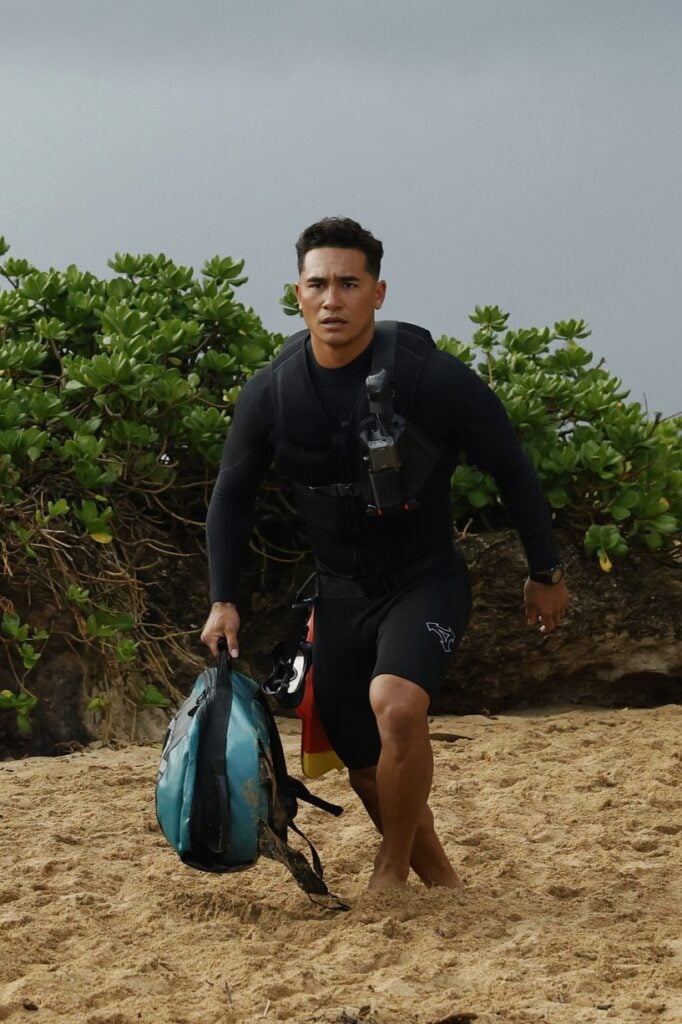 Laka races toward the water on Rescue: HI-Surf Season 1 Episode 5.