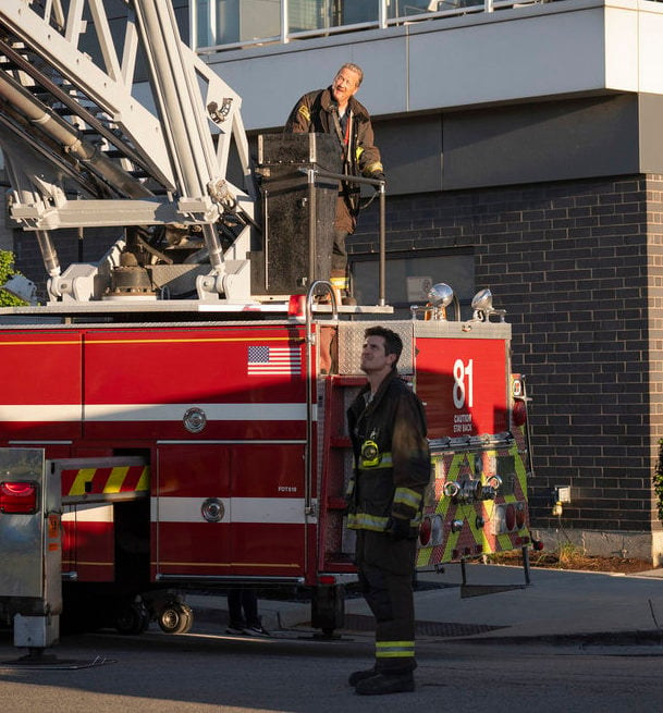 Mouch and Carver man the ladder truck.