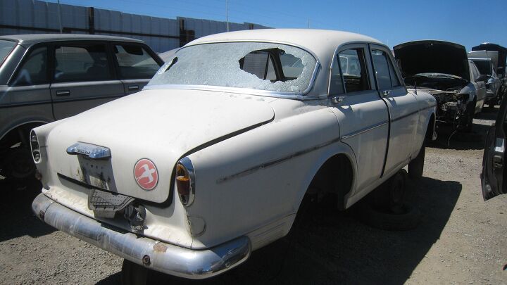 junkyard find pair of volvo amazons