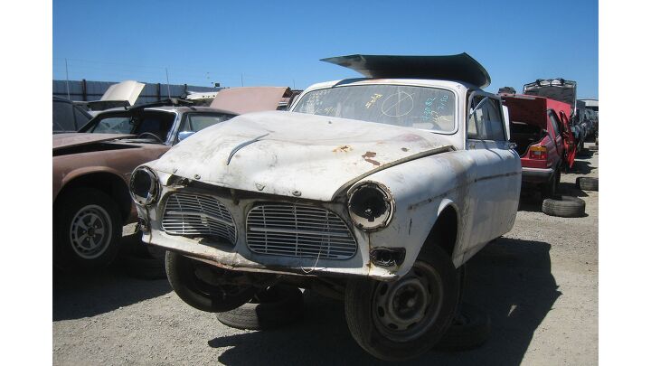 junkyard find pair of volvo amazons