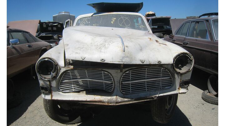 junkyard find pair of volvo amazons