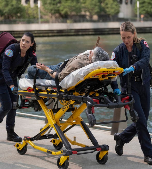 Violet and Lizzie transport a patient.