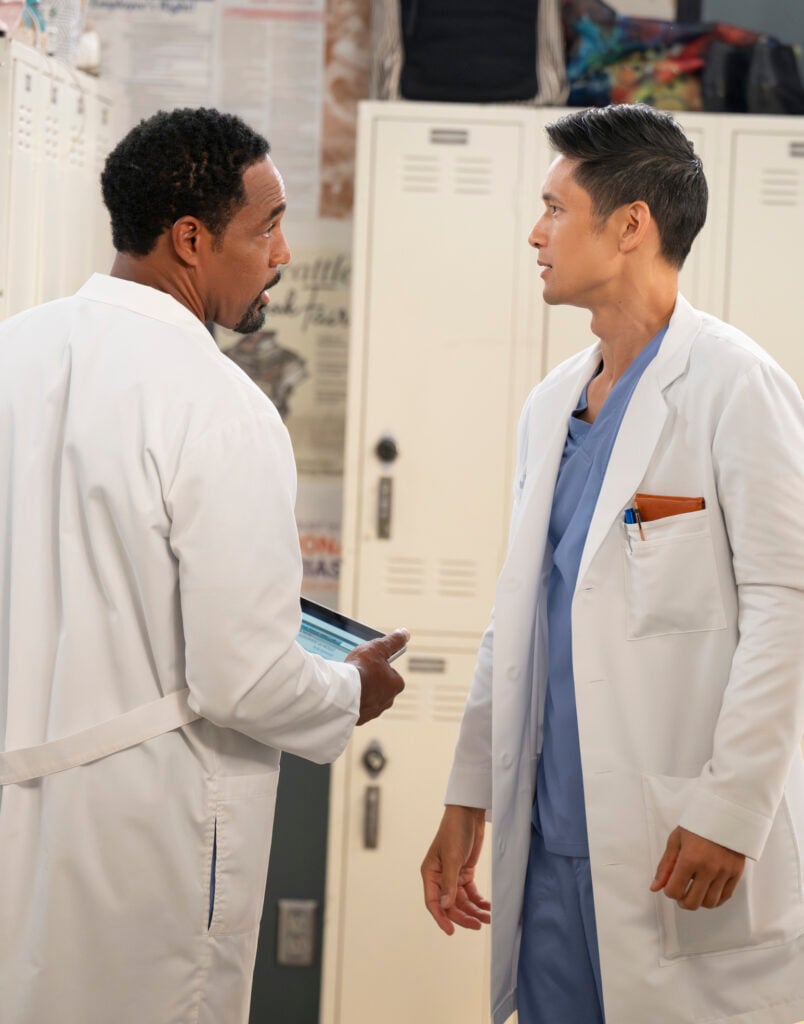 Warren talks to Blue in the locker room.