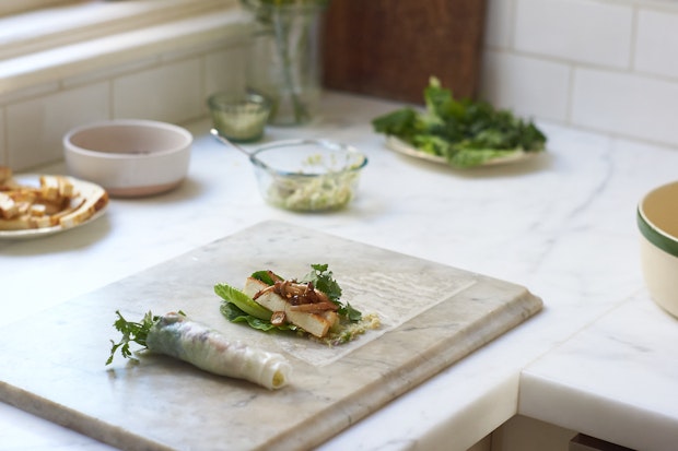 spring rolls assembly pictured on a kitchen countertop