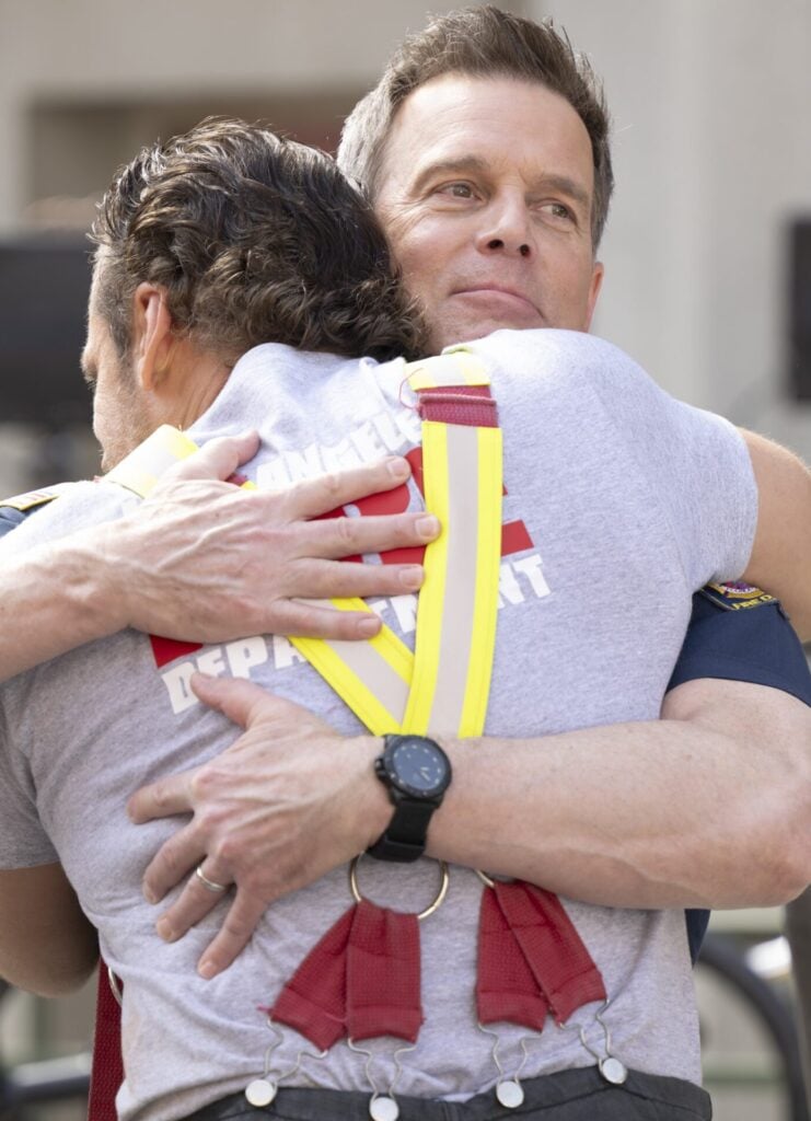 Bobby and Brad share a hug during 9-1-1 Season 8 Episode 7.