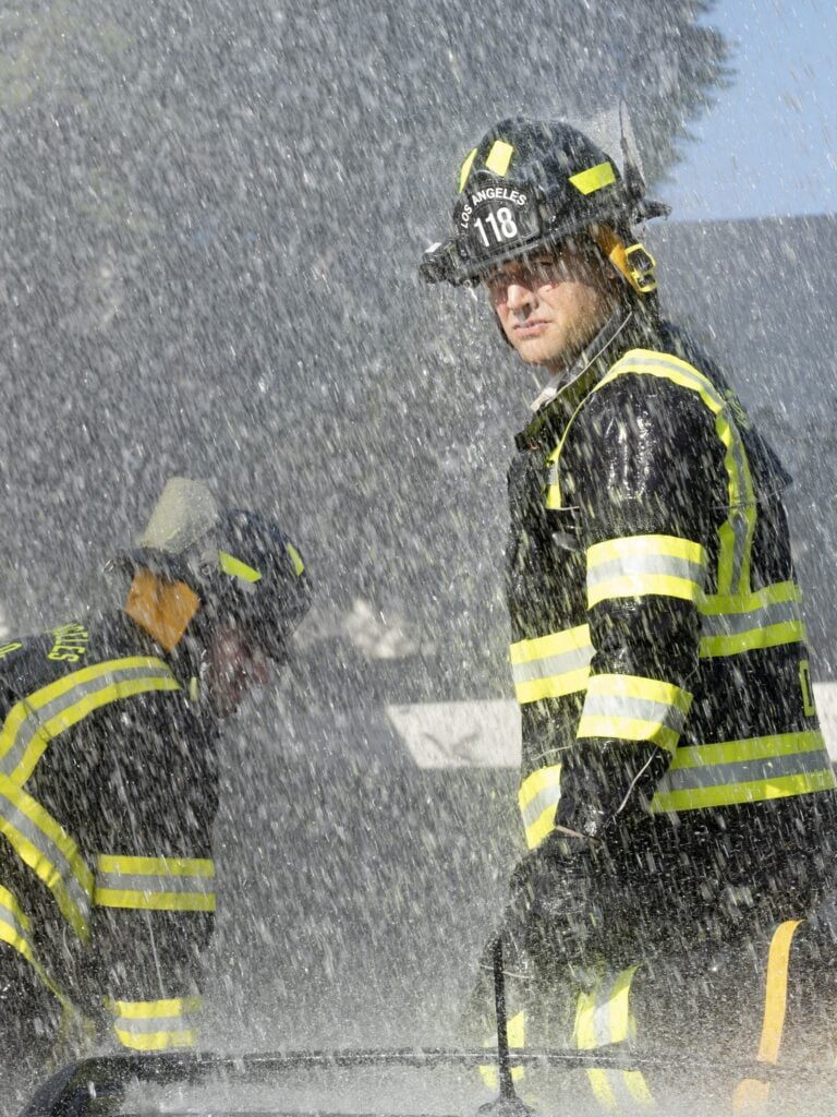 Buck and Eddie help out while the water falls during 9-1-1 Season 8 Episode 8.