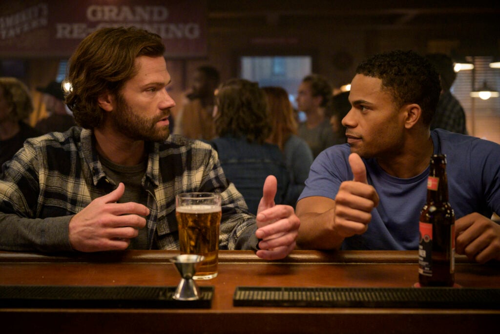 Jake and Camden sit at the bar