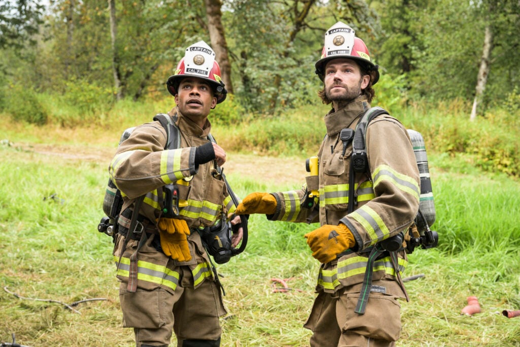 Jake and Camden look at a fire