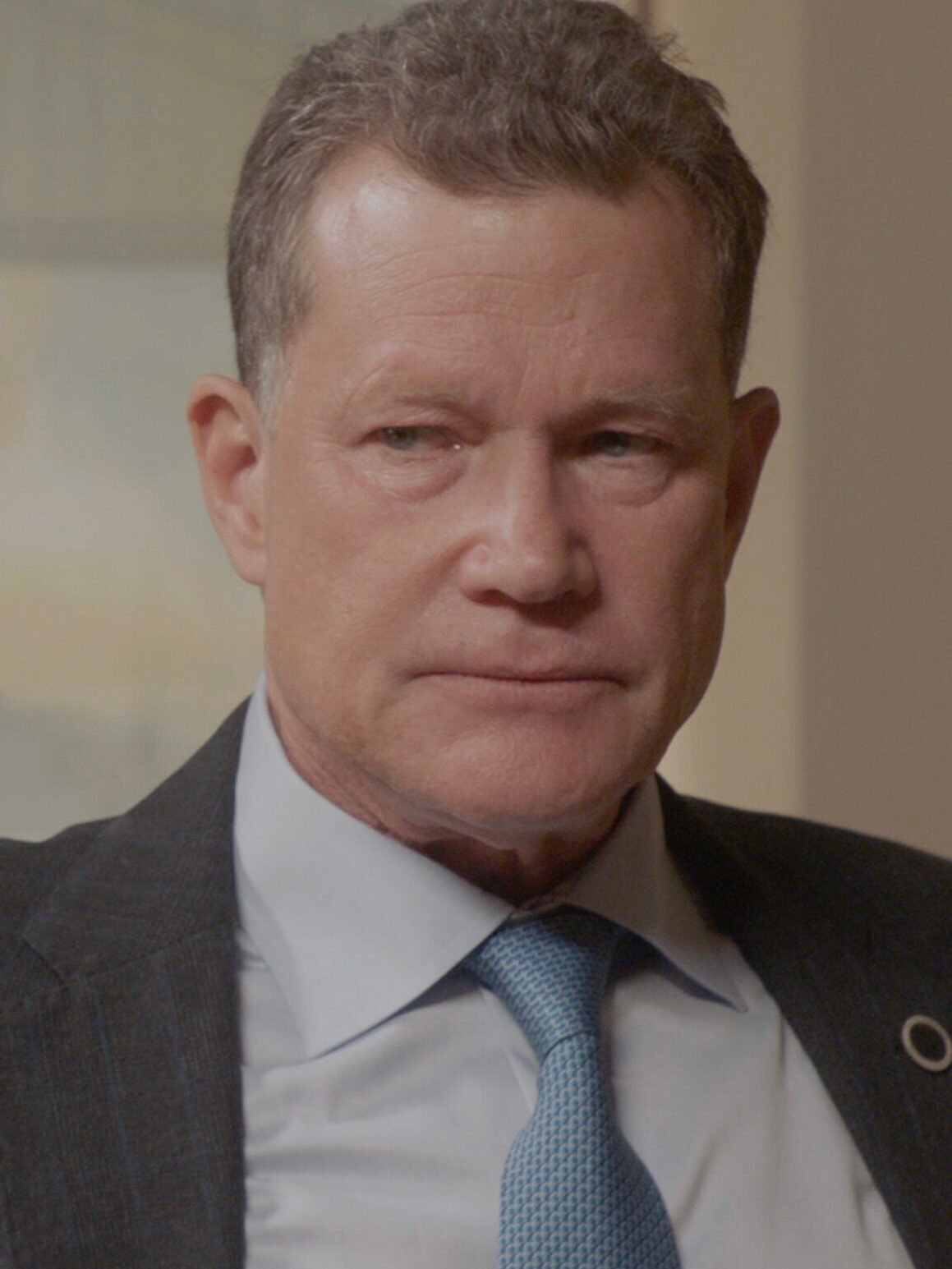 Mayor Chase standing and looking annoyed on Blue Bloods Season 14 Episode 15