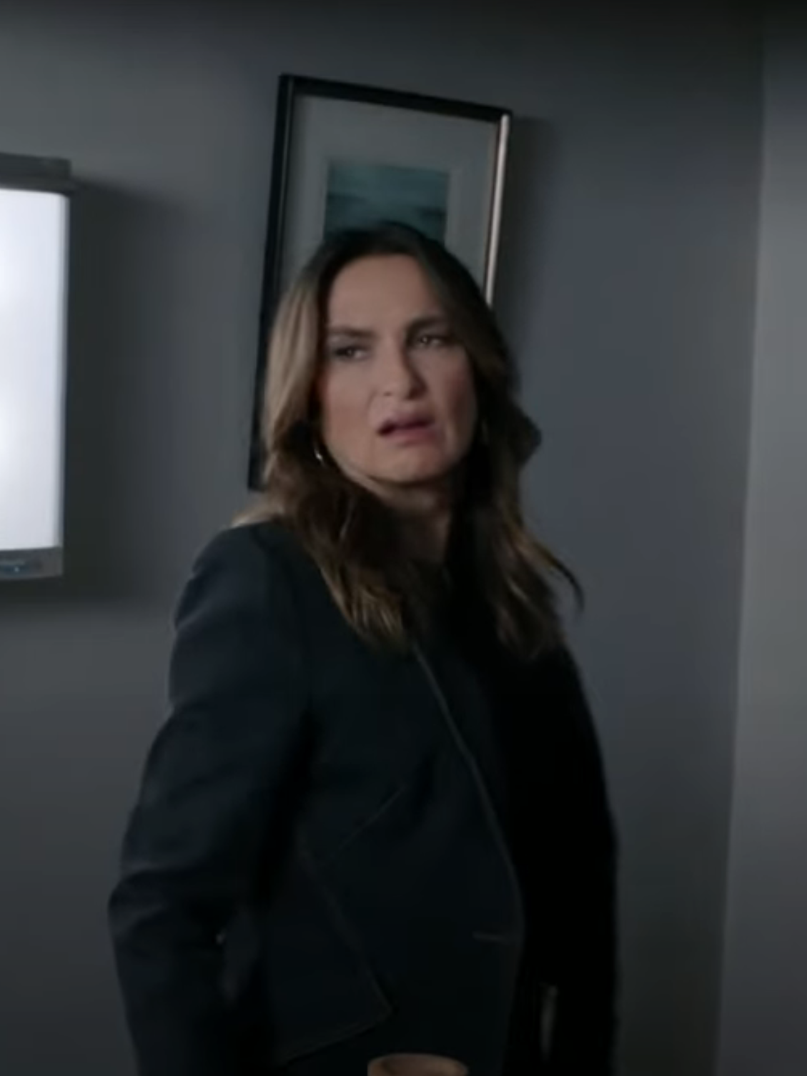 Benson standing in a room looking upset on Law & Order: SVU Season 26 Episode 6