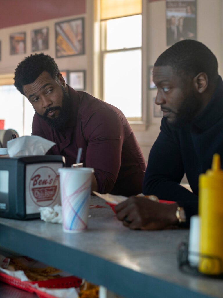 John and Alex at a diner.