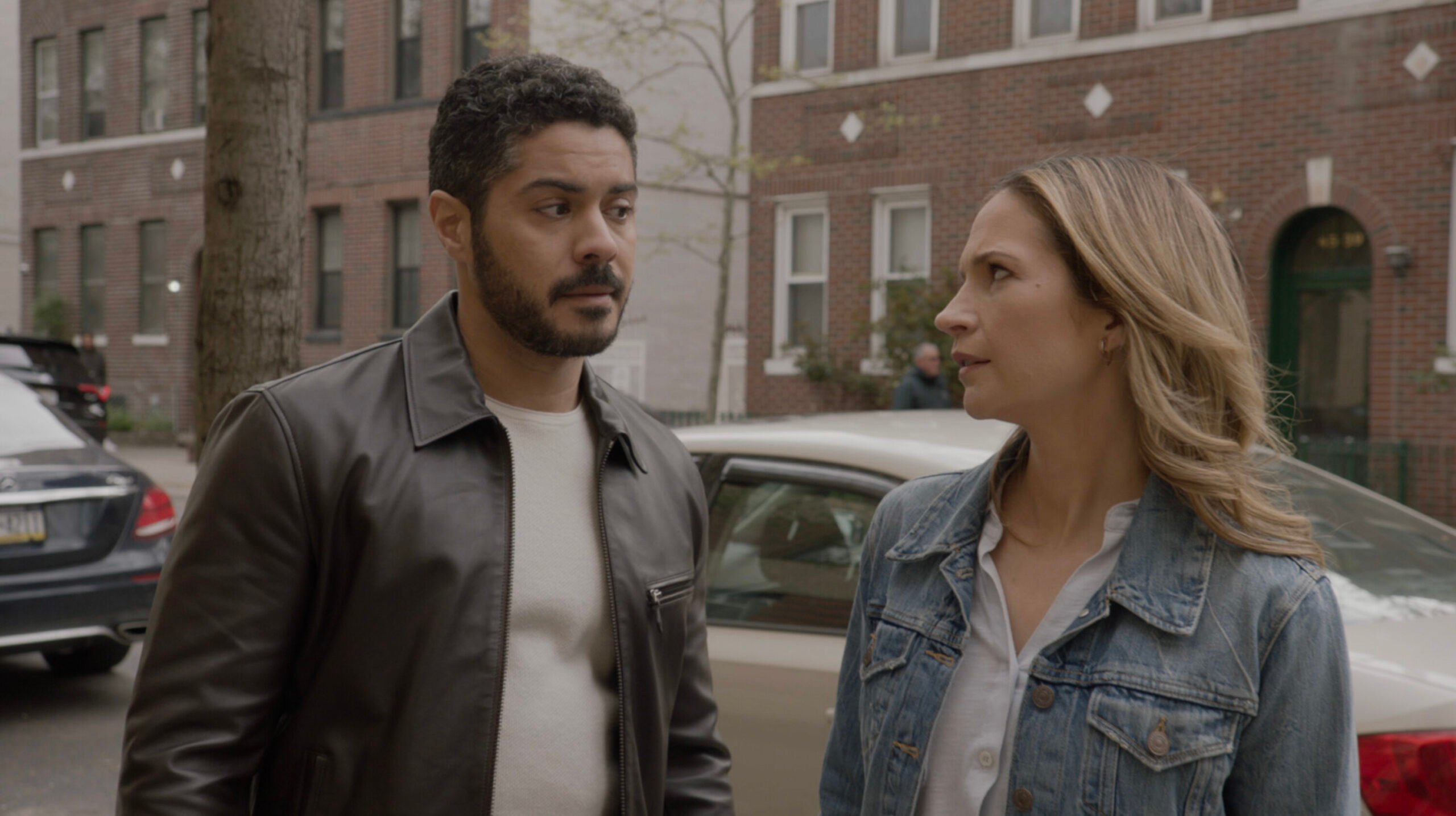 Badillo and Eddie in plainclothes giving each other weird looks on Blue Bloods Season 14 Episode 13