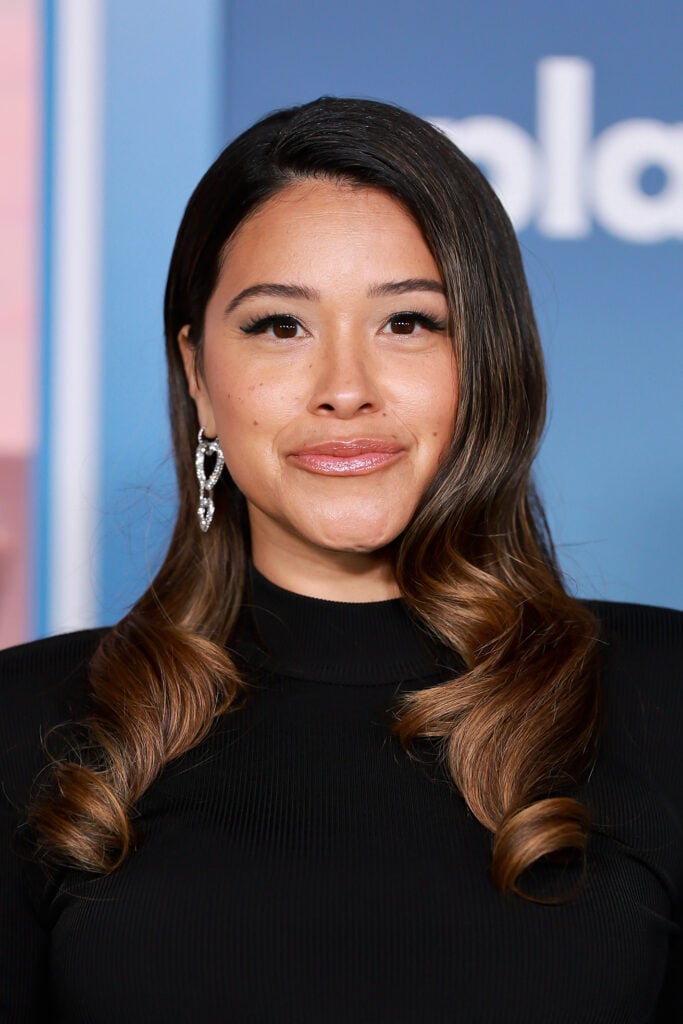 Gina Rodriguez attends the Photo Call for Netflix's "Players" at The Egyptian Theatre Hollywood on February 08, 2024 in Los Angeles, California. 