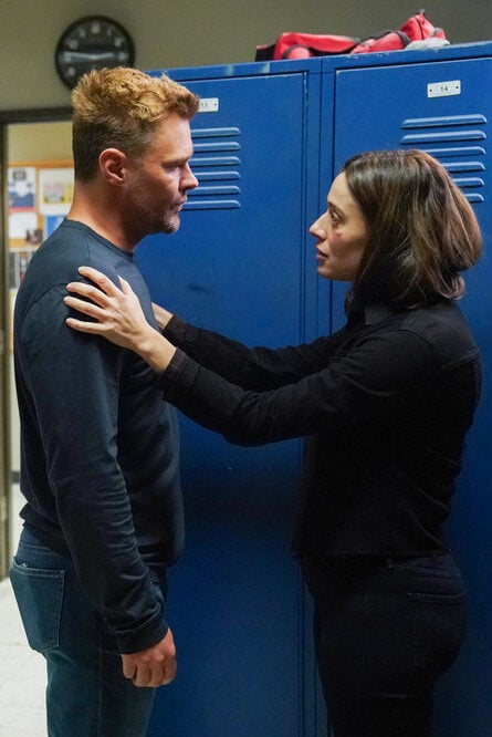 Burzek comfort in the locker room.