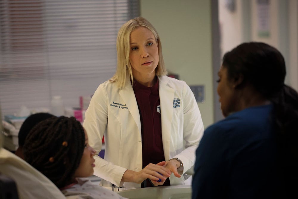 Hannah helps a patient on Chicago Med Season 10 Episode 6