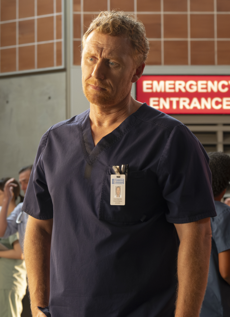 Owen stands outside the ER entrance.