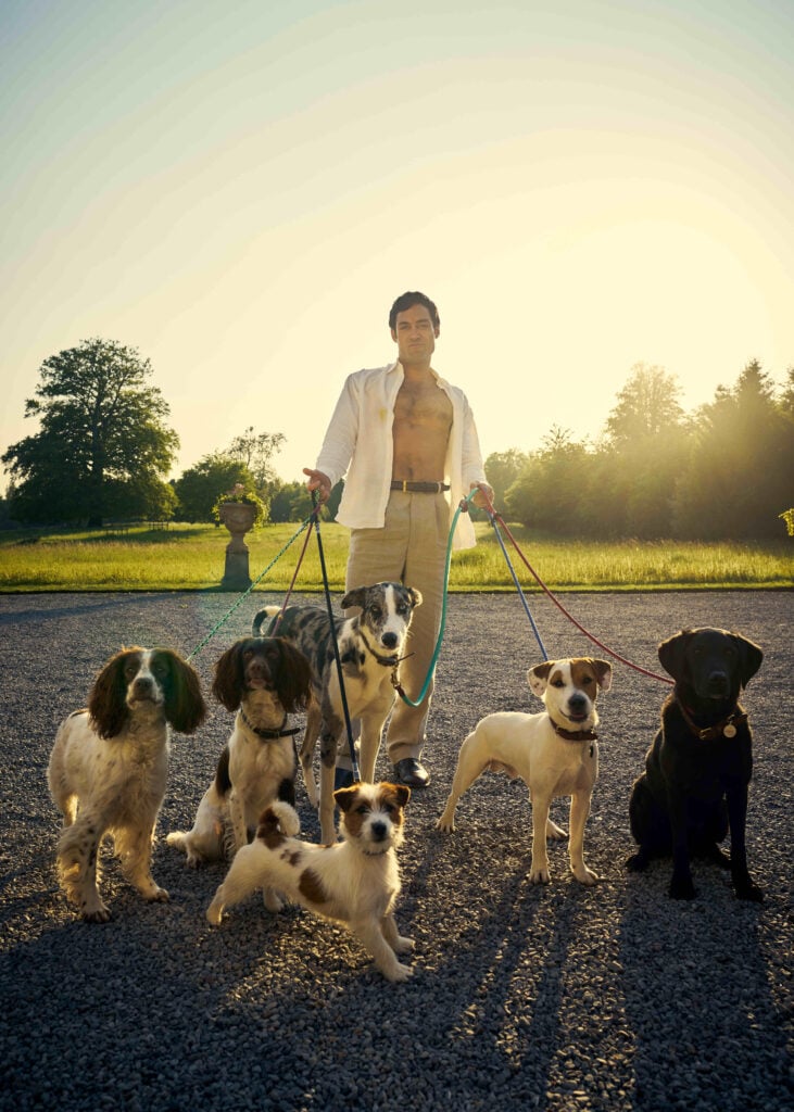 Rupert Campbell-Black spends time with his dogs during Rivals Season 1.