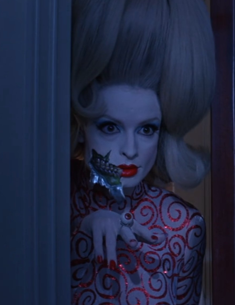 A martian in a human disguise sneaks into the president's bedroom in Mars Attacks.