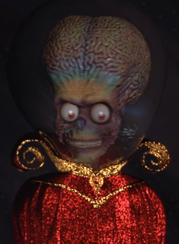 A martian walks off the spaceship in Mars Attacks.