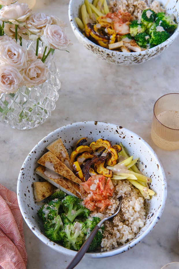 macro bowls served on a marble table with drinks