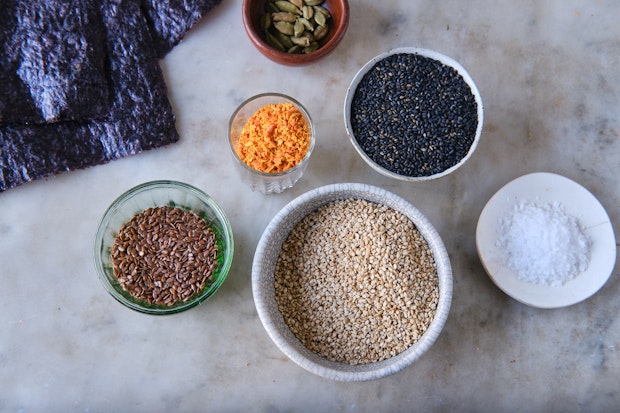 ingredients to make citrus furikake arranged in small bowls